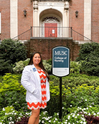 Laarni Sanders stands in from the the College of Nursing building on MUSC's campus.