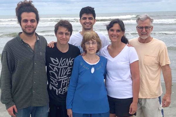 Nate Oberholtzer, a Ph.D. student at the MUSC College of Graduate Studies, poses on the beach with six members of his multi-generational family.
